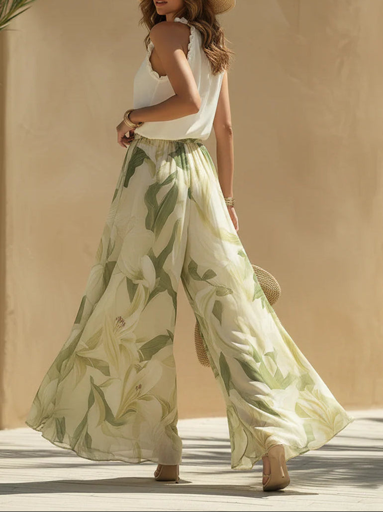 Alessandra - Completo Top Senza Maniche in Chiffon con Volants e Pantaloni con Stampa Lilium