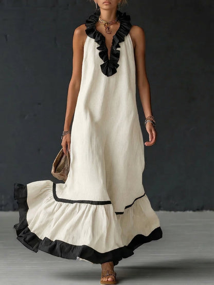 Vestito maxi elegante e romantico con volant e blocchi di colore