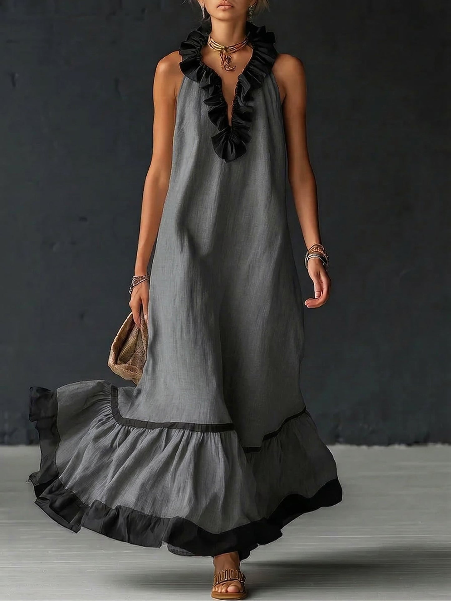 Vestito maxi elegante e romantico con volant e blocchi di colore