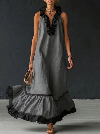 Vestito maxi elegante e romantico con volant e blocchi di colore